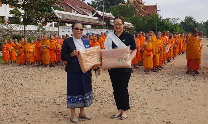 Giving Alms (blankets) to 500 Novices at Pha-O Temple in Luang Prabang